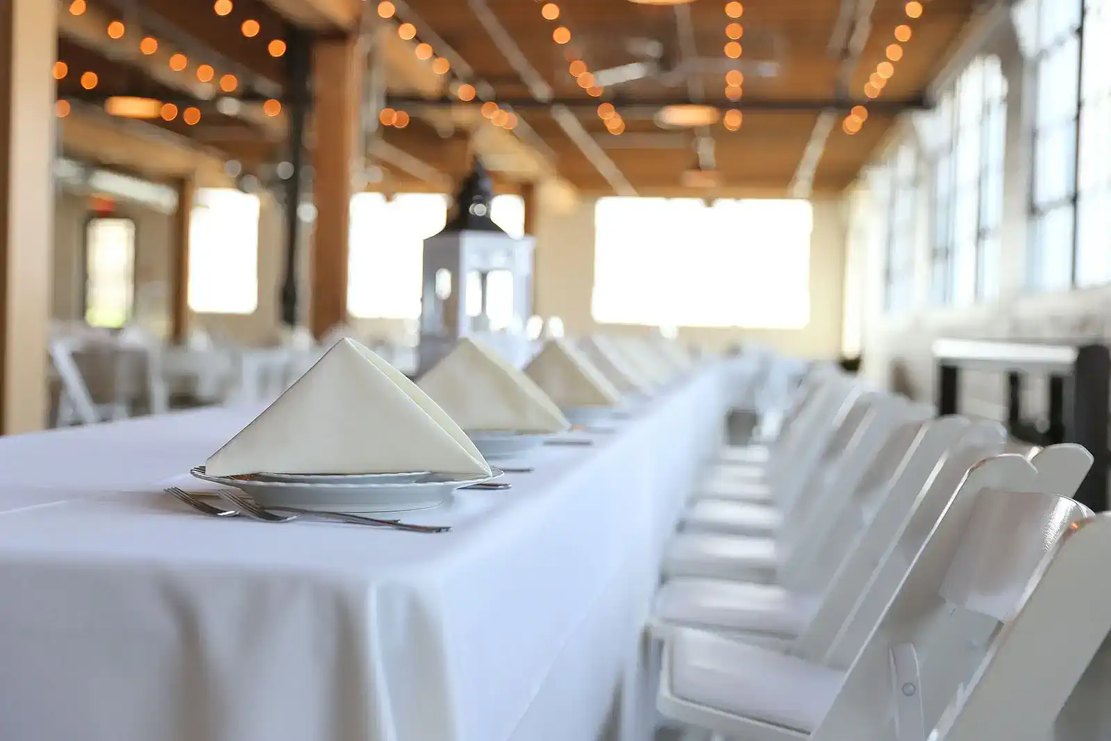 Long banquet table set for a catered event in Maitland, Florida